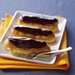 A plate of chocolate eclairs